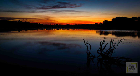 Dramatic sunset photograph, the kind of scene that never quite looks the same on camera as it did in person